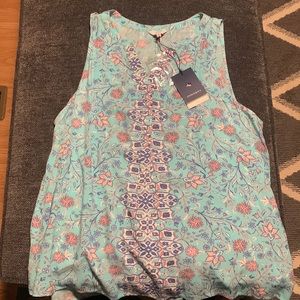Women’s floral half button up tank top. Brand new with tags
